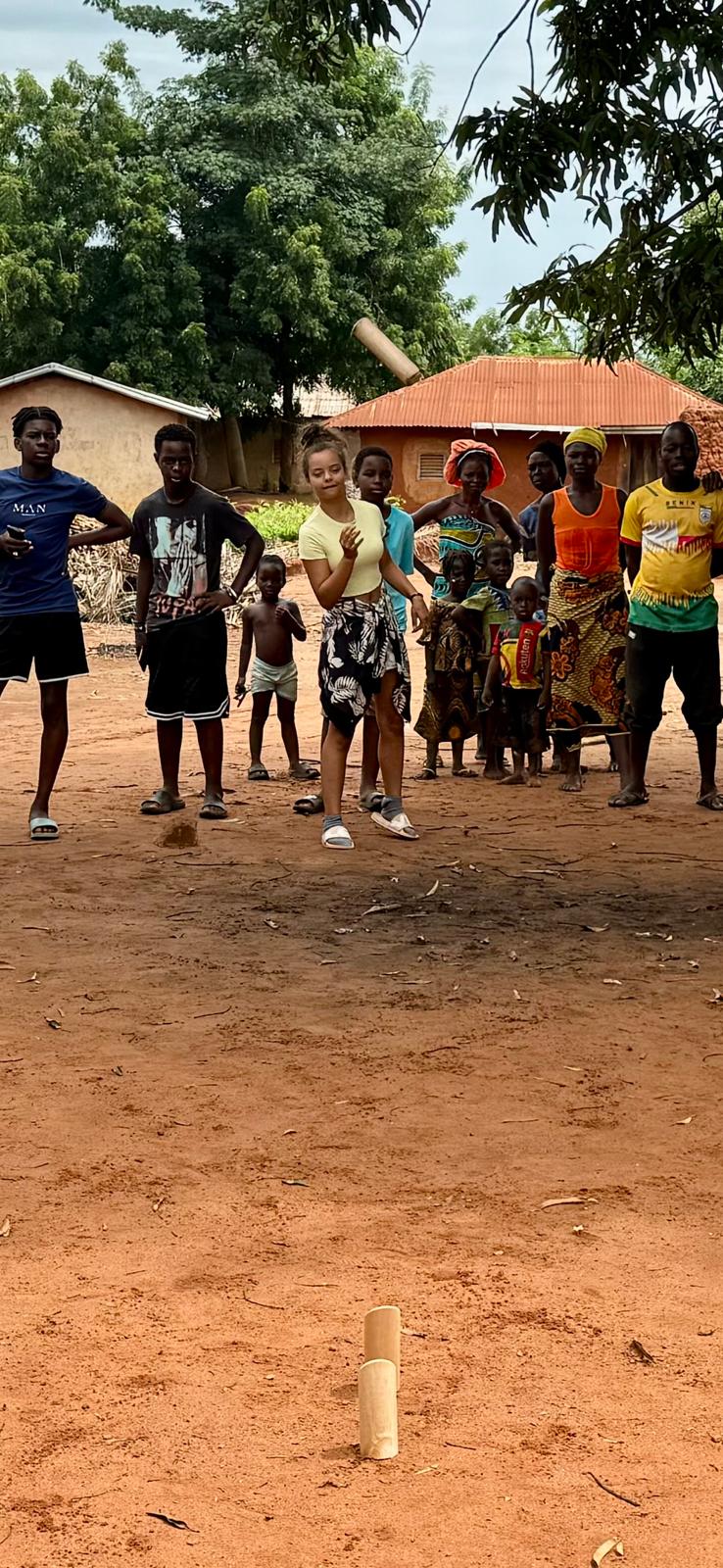 Children and residents during a village game