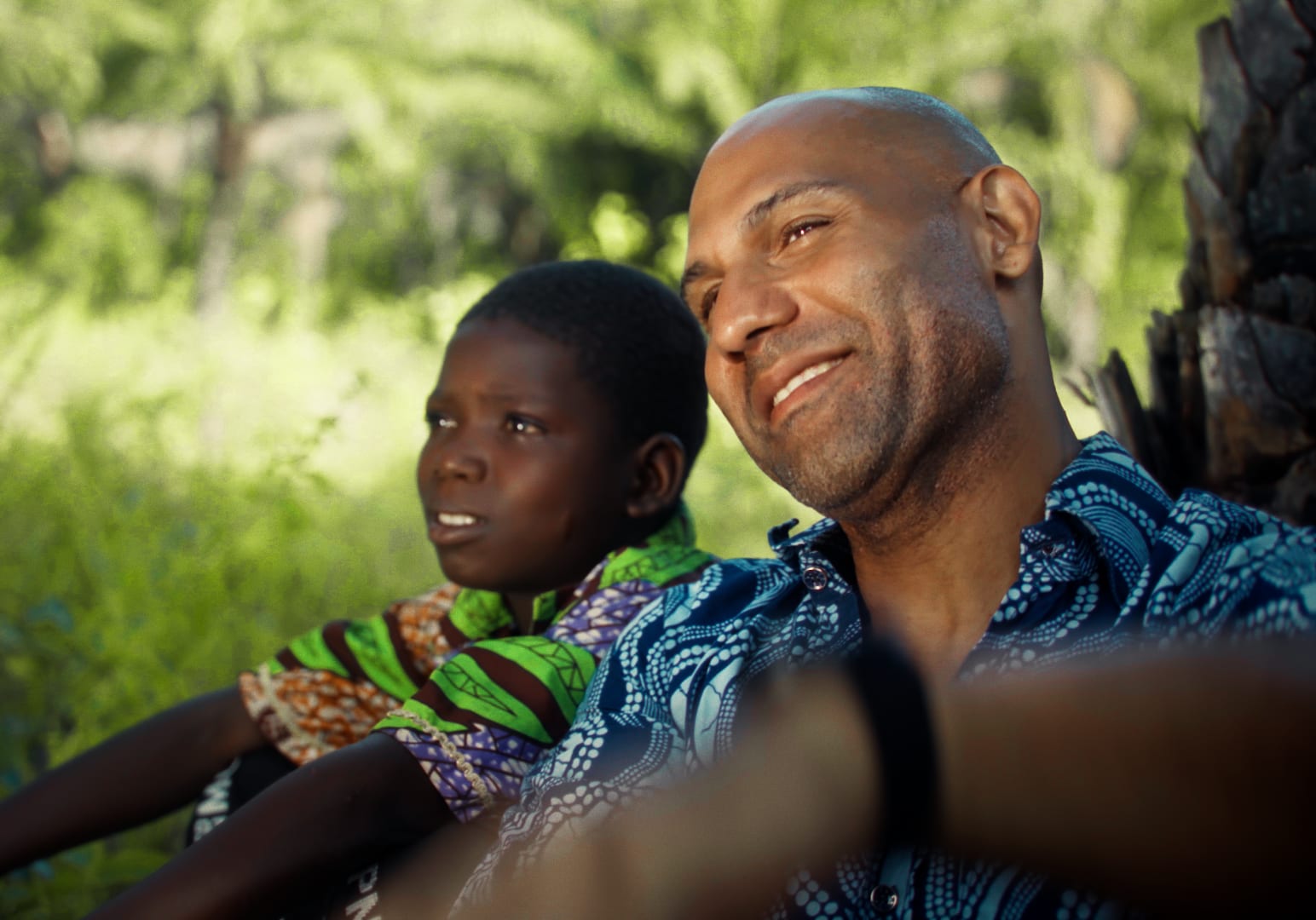 Man and child looking into the distance during the immersion